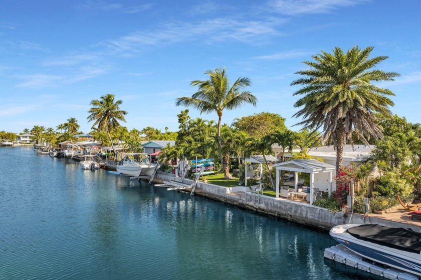 Welcome to 13 Arbutus Drive, an exceptional waterfront residence - Beach Home for sale in Key Haven, Florida on Beachhouse.com