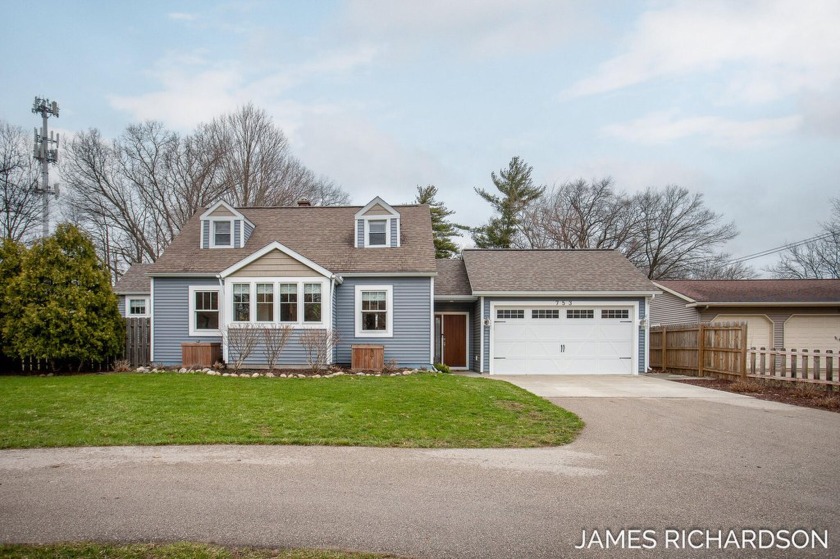 Welcome to this updated 3-bed, 3-bath Cape Cod home sitting on - Beach Home for sale in Spring Lake, Michigan on Beachhouse.com