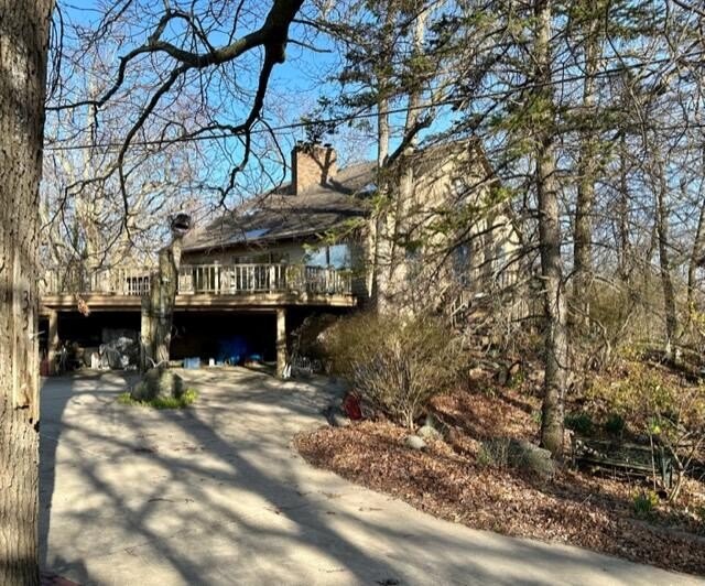 Secluded wooded setting overlooking Lake Michigan!!  Started in - Beach Home for sale in Stevensville, Michigan on Beachhouse.com