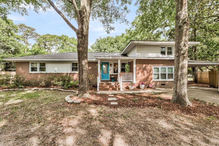 Nestled on a spacious .41-acre homesite with mature trees and a - Beach Home for sale in Charleston, South Carolina on Beachhouse.com
