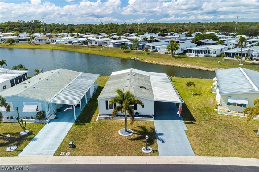 Enjoy lakefront views and those gorgeous Florida sunsets!! Move - Beach Home for sale in North Fort Myers, Florida on Beachhouse.com