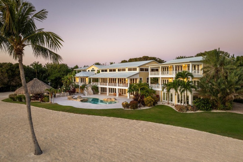 Escape to Palm Paradise, a one-of-a-kind oceanfront estate in - Beach Home for sale in Plantation Key, Florida on Beachhouse.com