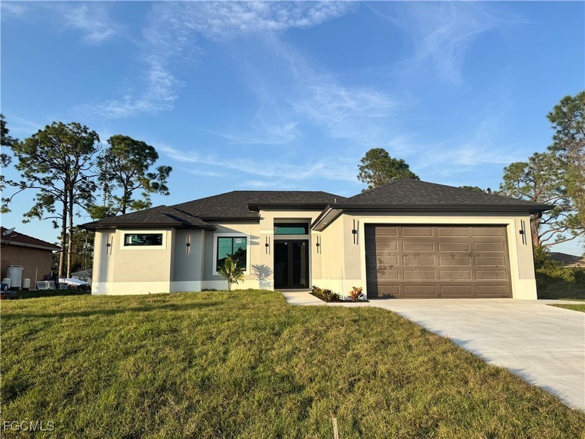 Discover exceptional value in this stunning new construction - Beach Home for sale in Lehigh Acres, Florida on Beachhouse.com