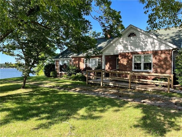 Waterfront brick rancher nestled on top of a hill overlooking - Beach Home for sale in Dutton, Virginia on Beachhouse.com