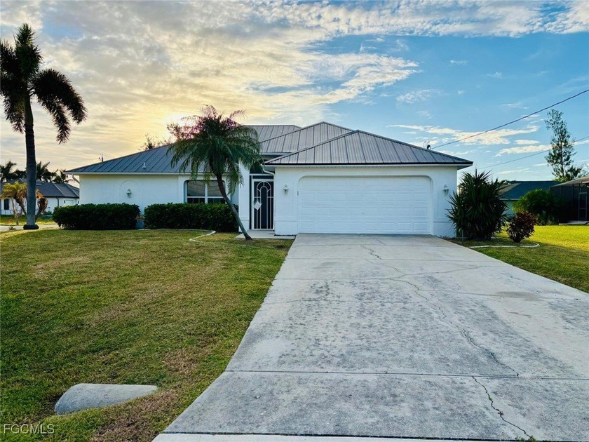 Welcome to this cozy single-level residence located on a corner - Beach Home for sale in Cape Coral, Florida on Beachhouse.com