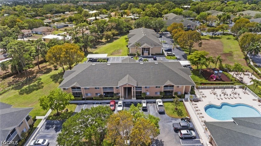 Bright and inviting, this second-floor 2-bedroom plus den - Beach Condo for sale in Bonita Springs, Florida on Beachhouse.com