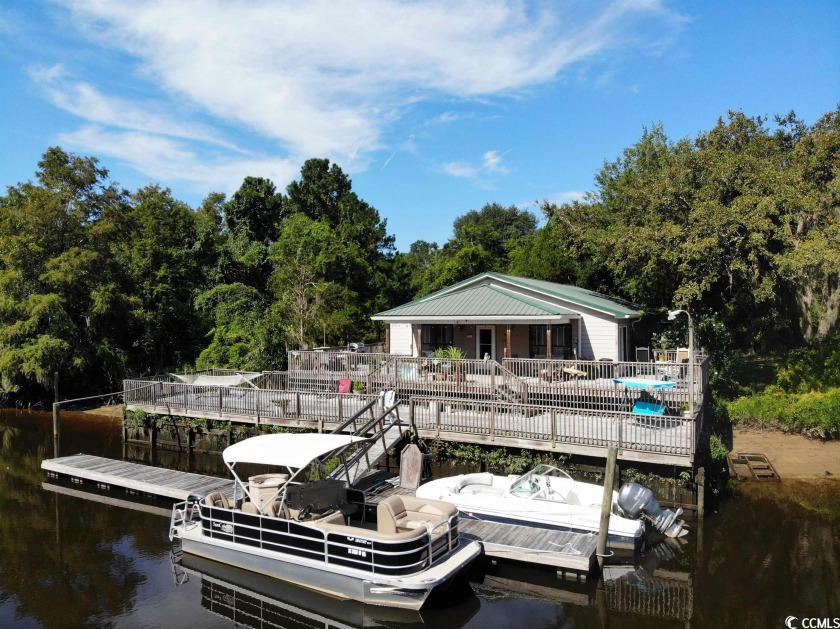 Welcome to 33 Boating Lane, a hidden Sandy Island oasis that - Beach Home for sale in Pawleys Island, South Carolina on Beachhouse.com