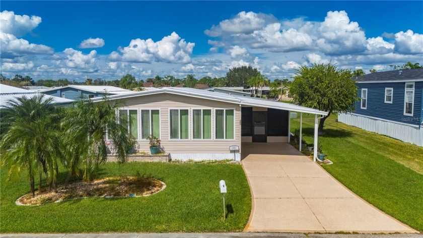 Life at Harbor Isles is all about connection-neighbors waving - Beach Home for sale in North Port, Florida on Beachhouse.com