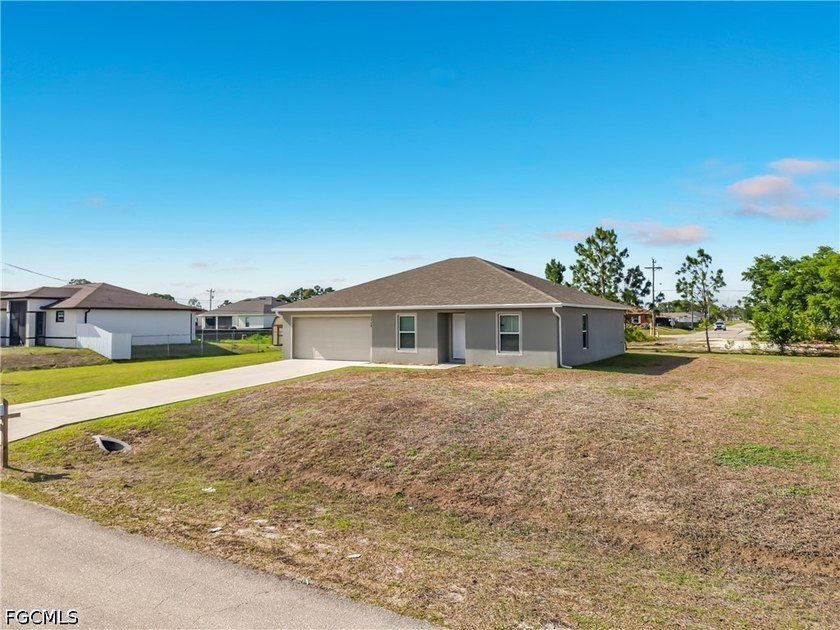 Welcome to this like-new 2021-built home situated on a rare - Beach Home for sale in Lehigh Acres, Florida on Beachhouse.com