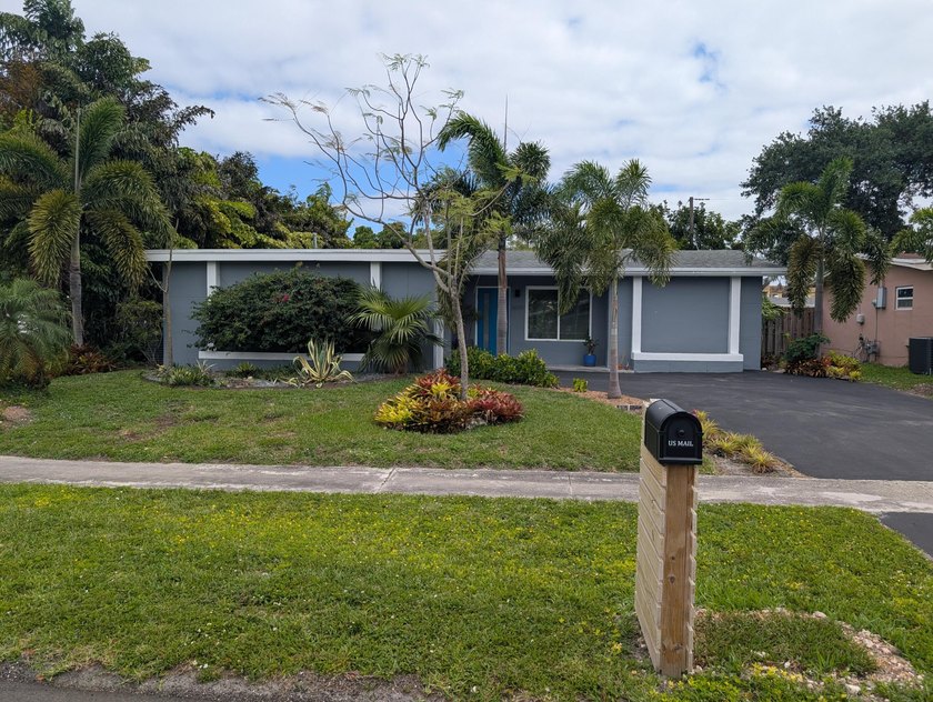 Located in outstanding and sought after Sunrise Golf Village - Beach Home for sale in Sunrise, Florida on Beachhouse.com
