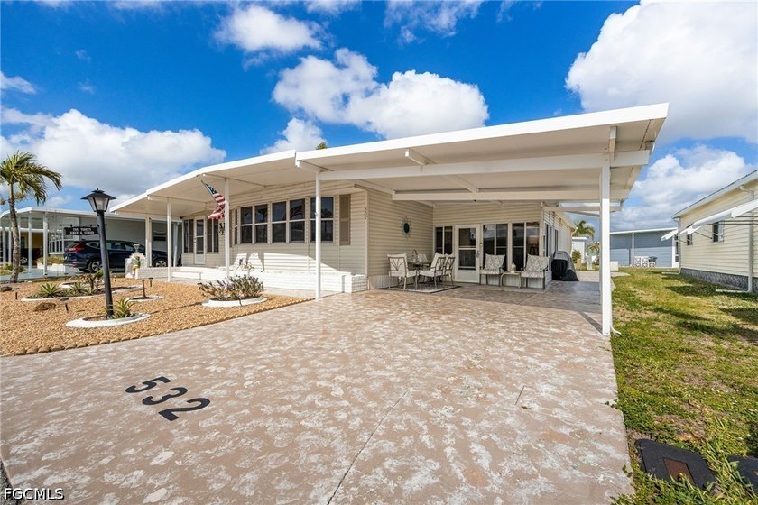 Welcome to your dream home in Six Lakes Country Club! This - Beach Home for sale in North Fort Myers, Florida on Beachhouse.com