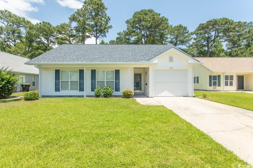 Clean well maintained home with laminate flooring through out - Beach Home for sale in Little River, South Carolina on Beachhouse.com