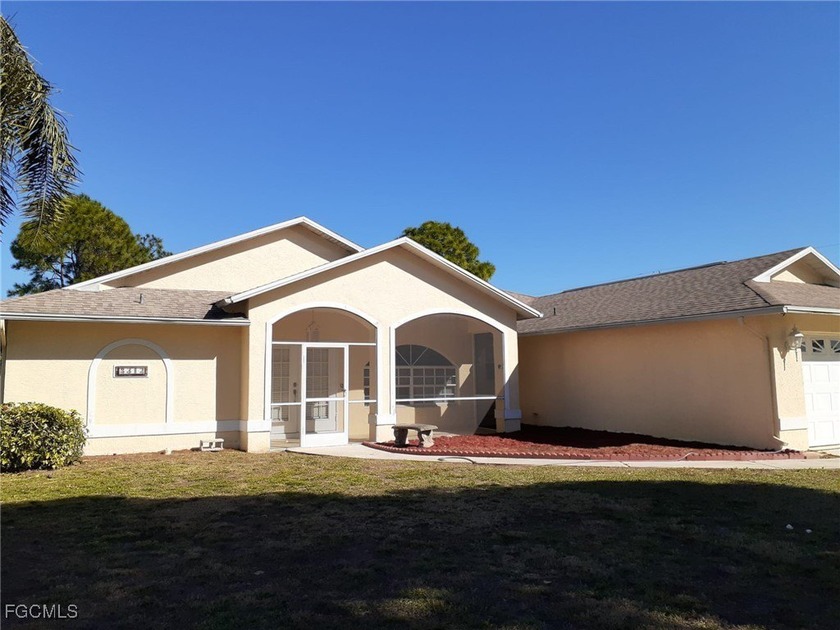 This Gorgeous Mastercraft Pool Home Features 3 Bedrooms, 2 - Beach Home for sale in Lehigh Acres, Florida on Beachhouse.com