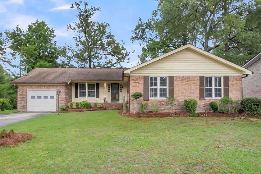 This completely renovated home is beautifully situated along a - Beach Home for sale in North Charleston, South Carolina on Beachhouse.com