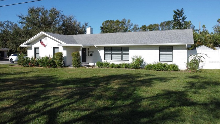 This is a beautiful 4 bedroom, 2 bath Belleair pool home within - Beach Home for sale in Belleair Beach, Florida on Beachhouse.com