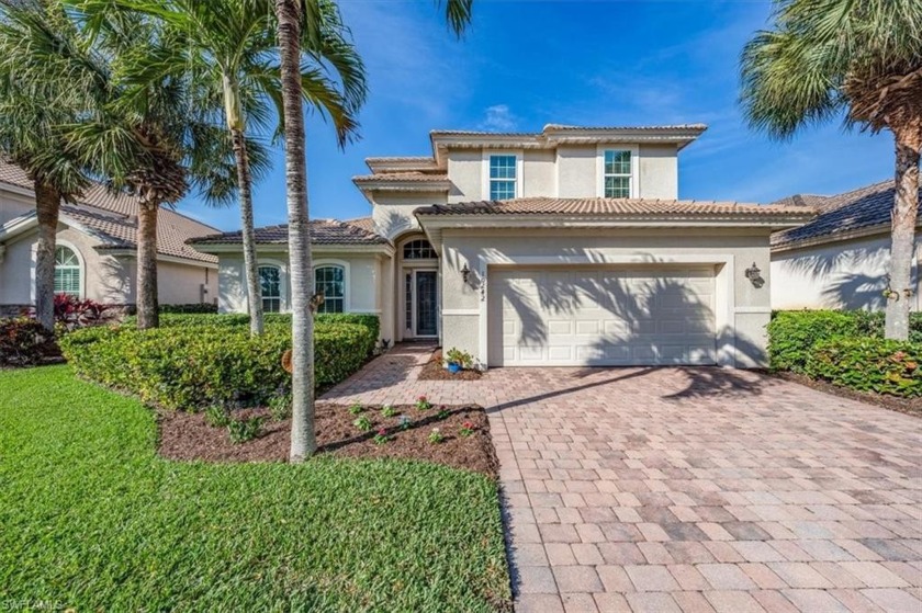 Spacious two-story home with main level primary suite boasting - Beach Home for sale in Bonita Springs, Florida on Beachhouse.com