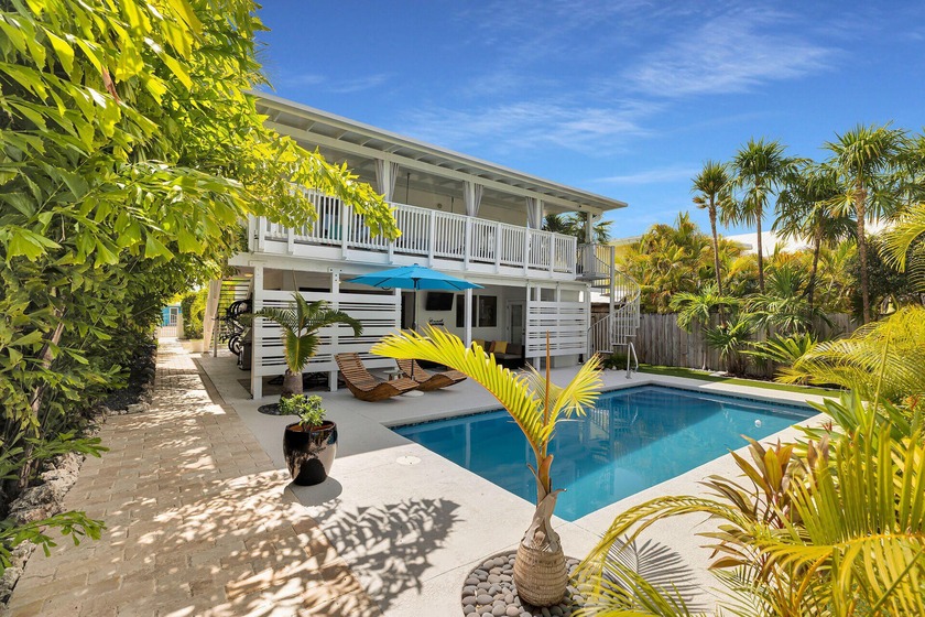Waterfront living in desirable Plantation Key!Step through the - Beach Home for sale in Plantation Key, Florida on Beachhouse.com