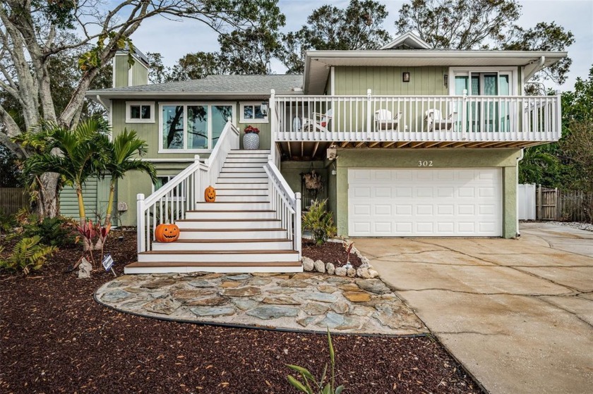 Sitting beautifully on a lush .20 acre lot in Ozona of Palm - Beach Home for sale in Palm Harbor, Florida on Beachhouse.com