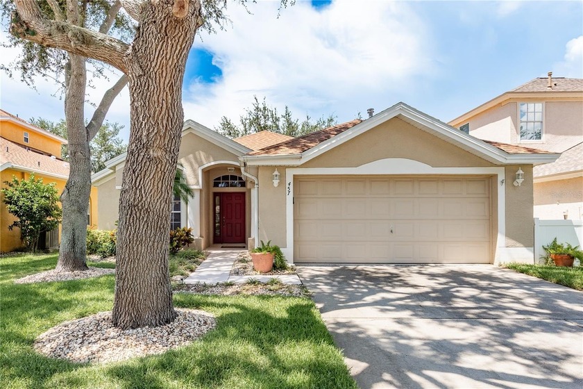 This beautifully maintained 3-bedroom, 2-bath home is located in - Beach Home for sale in Tarpon Springs, Florida on Beachhouse.com