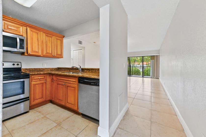 Step into this inviting 2-bedroom, 2-bath condo located in the - Beach Condo for sale in West Palm Beach, Florida on Beachhouse.com