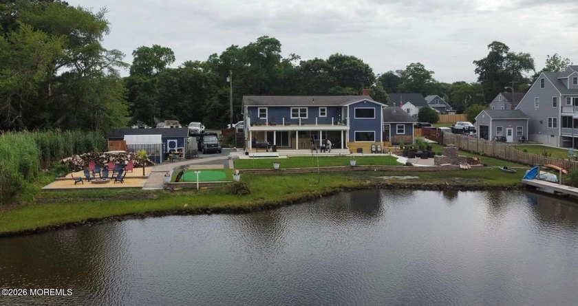 Experience exceptional waterfront living at 515 Riverside Drive - Beach Home for sale in Bayville, New Jersey on Beachhouse.com