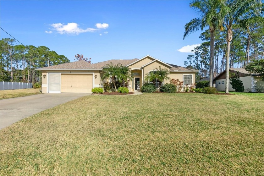 This well-maintained, move-in-ready pool home is located on an - Beach Home for sale in Palm Coast, Florida on Beachhouse.com