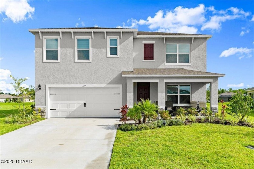 Experience lakeside living in this stunning, nearly new - Beach Home for sale in Ormond Beach, Florida on Beachhouse.com