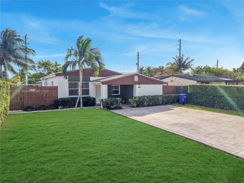 This beautifully remodeled 3-bedroom, 2-bathroom Home is nestled - Beach Home for sale in North Miami Beach, Florida on Beachhouse.com