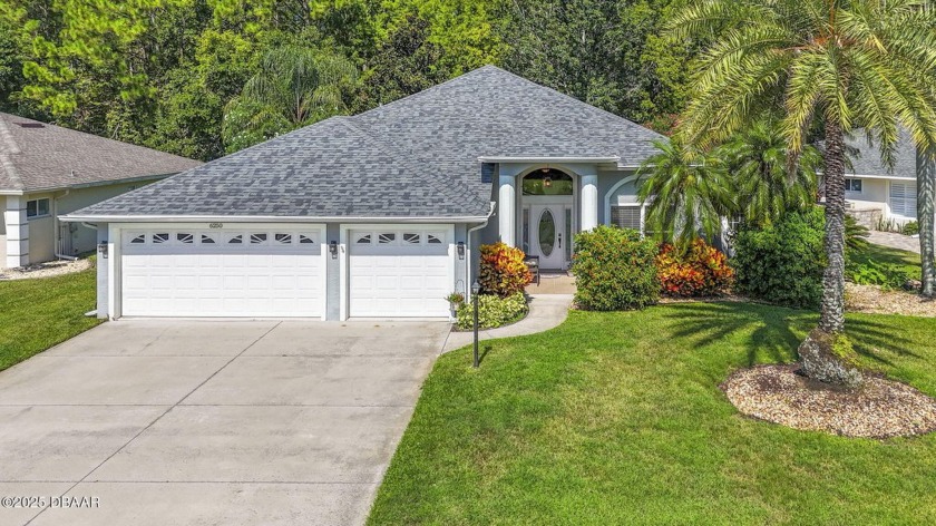 Welcome to this charming three-bedroom, two-bathroom home with - Beach Home for sale in Port Orange, Florida on Beachhouse.com