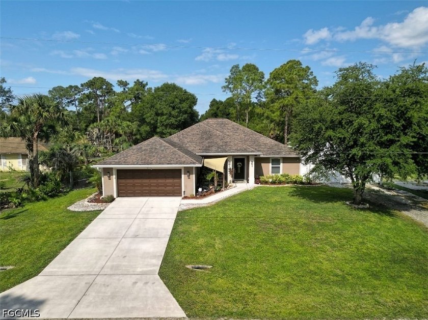 This custom built 2015 home offers 4 bedrooms and over 2000 - Beach Home for sale in Lehigh Acres, Florida on Beachhouse.com