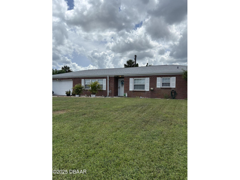 Set in an older established neighborhood, ranch style home with - Beach Home for sale in Daytona Beach, Florida on Beachhouse.com