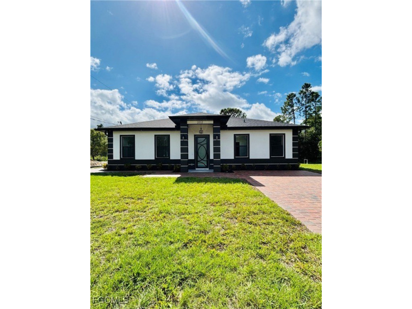 Welcome to this Stunning 4 bedroom and 3 bathroom modern home - Beach Home for sale in Lehigh Acres, Florida on Beachhouse.com