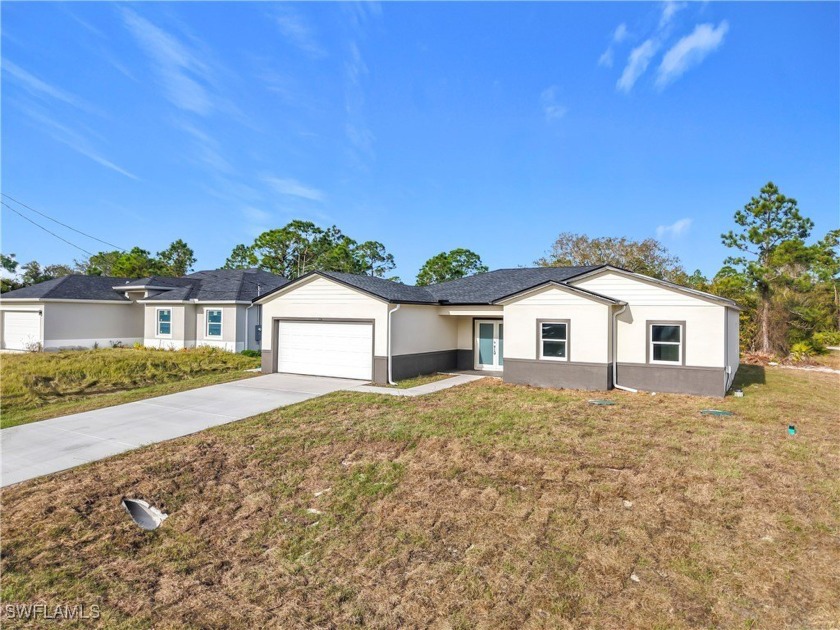 NEW BUILD COMPLETE - MOVE-IN READY - CORNET LOT The 1 - Beach Home for sale in Lehigh Acres, Florida on Beachhouse.com