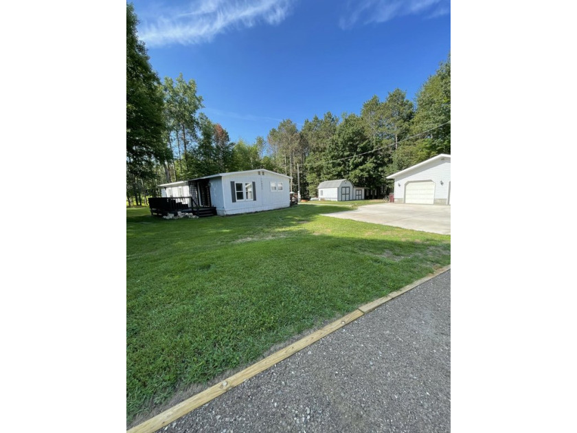 Charming move in ready home on 3 lots in Upper Silver Lake - Beach Home for sale in Mears, Michigan on Beachhouse.com