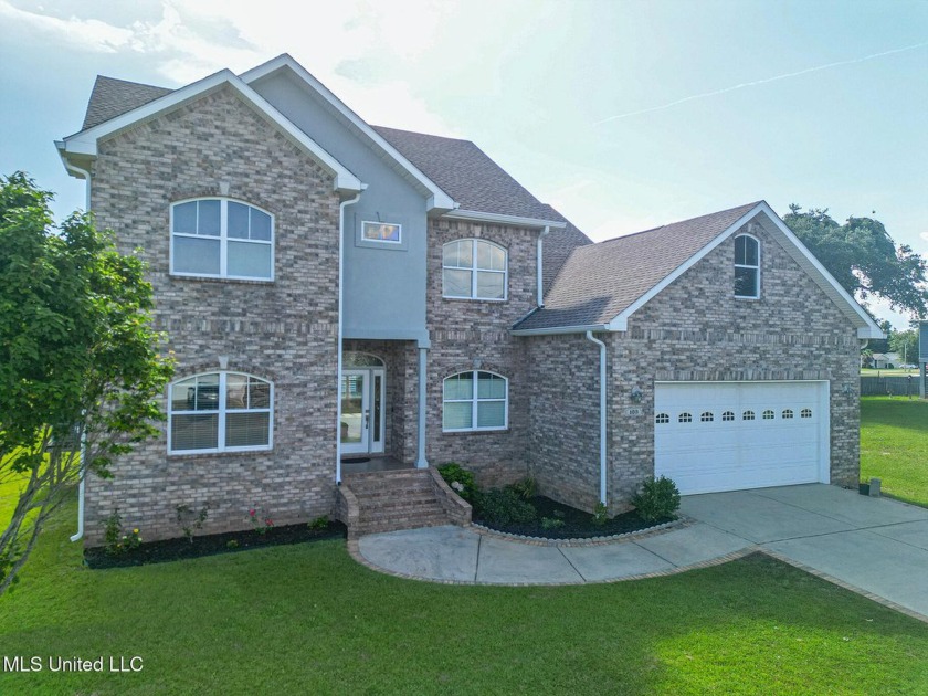 Discover this stunning 4-bedroom, 3.5-bathroom two-story home - Beach Home for sale in Long Beach, Mississippi on Beachhouse.com