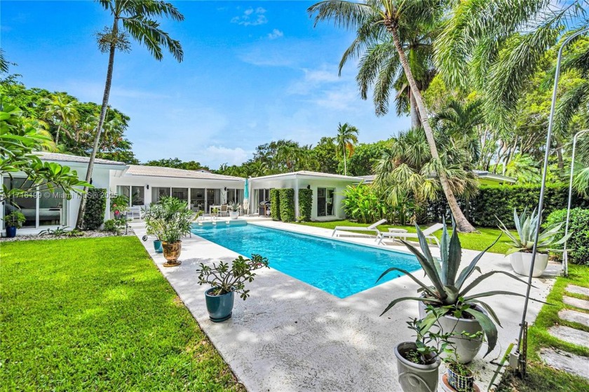 Welcome to this mid-century tropical oasis on a large 12k sf lot - Beach Home for sale in Coral Gables, Florida on Beachhouse.com