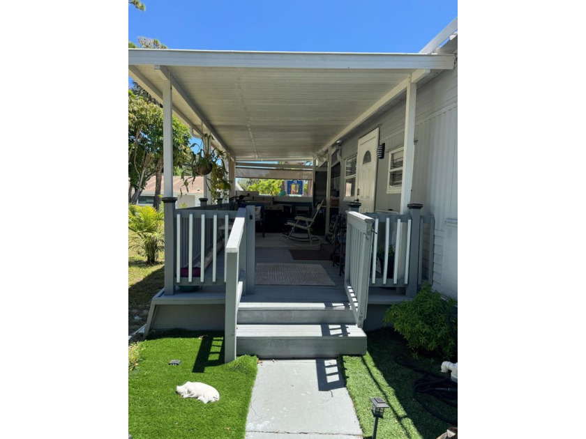 Charming mobile home featuring 3 bedrooms, 2 bathrooms,  All age - Beach Home for sale in Palm Beach Gardens, Florida on Beachhouse.com