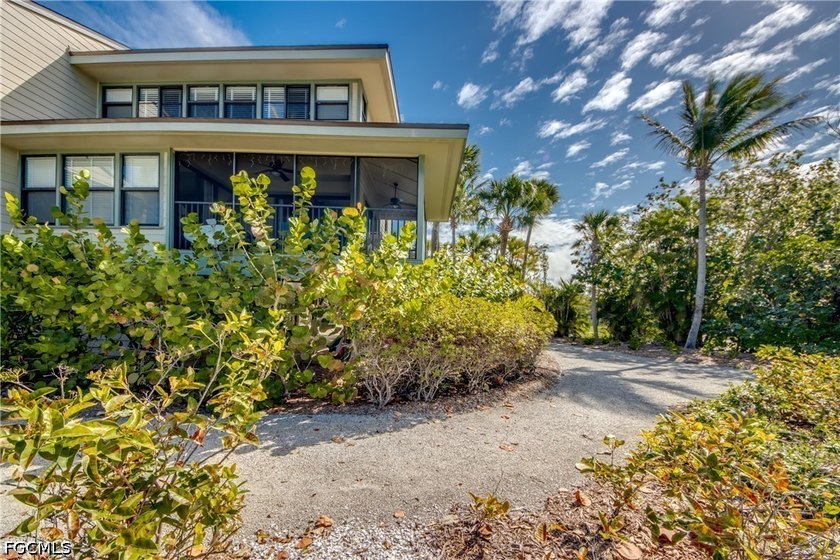 Stunning Waterfront End-Unit Condo with Direct Gulf Access in - Beach Condo for sale in Bokeelia, Florida on Beachhouse.com