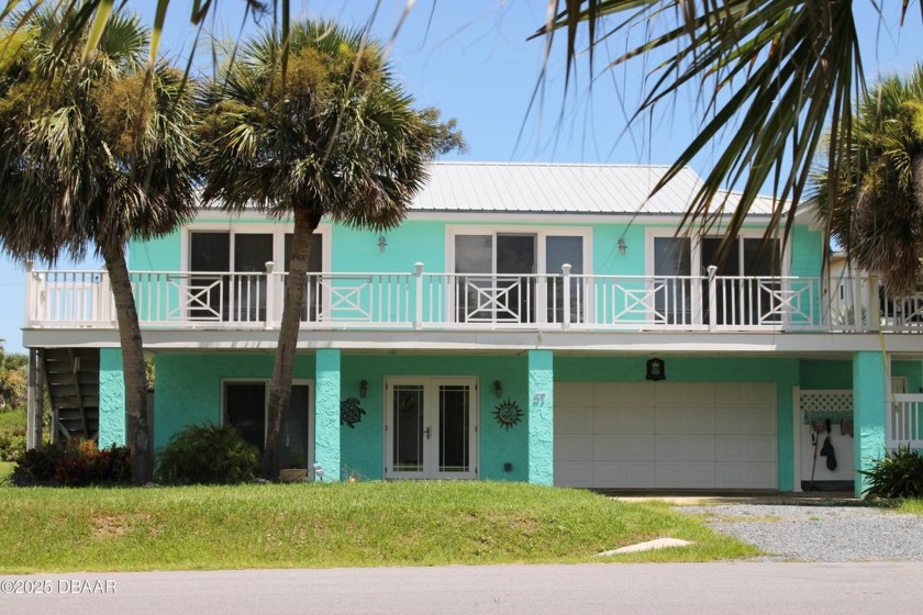 This 2-bedroom, 2-bath ocean-view pool home sits just one minute - Beach Home for sale in Palm Coast, Florida on Beachhouse.com