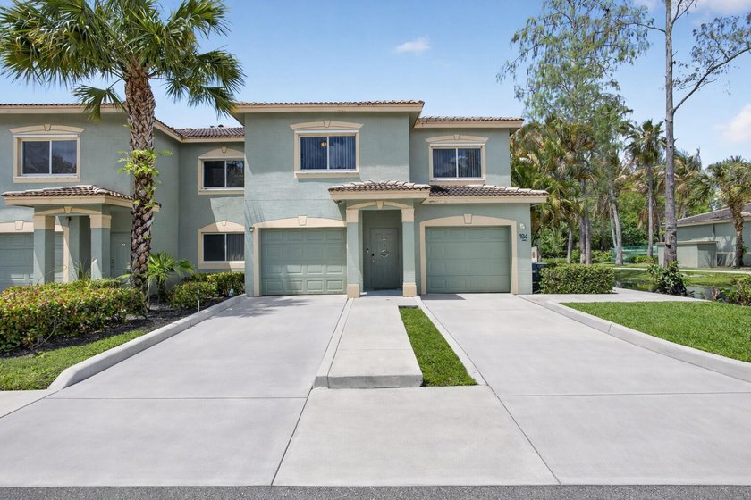 Beautiful 3-bedroom, 2-bath townhome with serene pond views in - Beach Condo for sale in Royal Palm Beach, Florida on Beachhouse.com