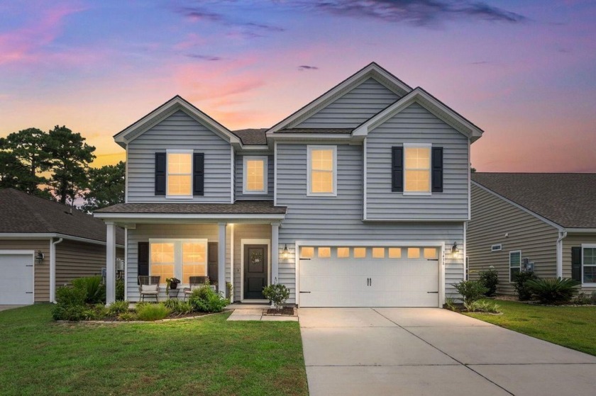 Step into this beautifully designed dual main-suite home with - Beach Home for sale in Johns Island, South Carolina on Beachhouse.com