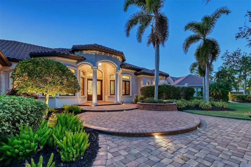 Welcome to this breathtaking Peregrine CUSTOM-BUILT ESTATE, a - Beach Home for sale in Lakewood Ranch, Florida on Beachhouse.com