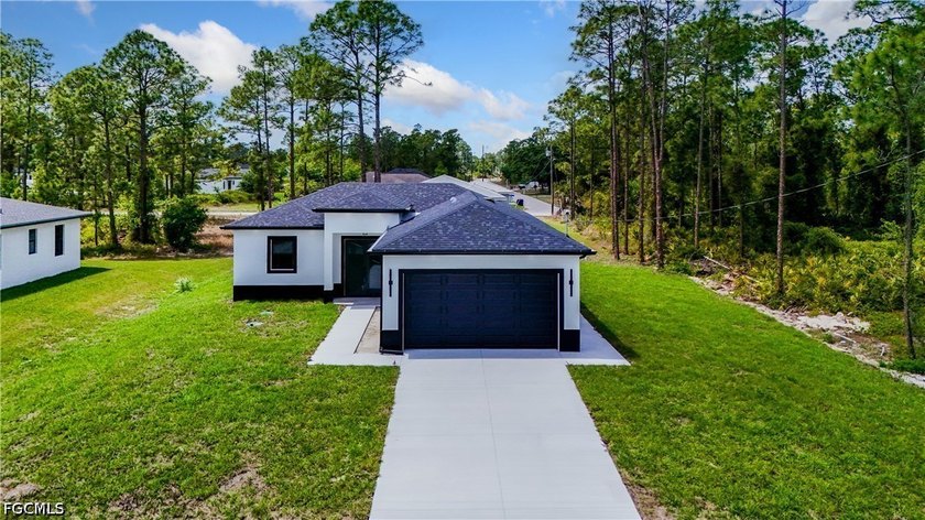 Beautiful new construction home featuring 3 bed / 2 bath with 1 - Beach Home for sale in Lehigh Acres, Florida on Beachhouse.com