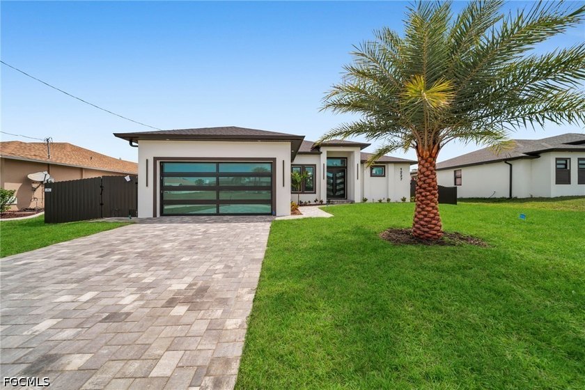 Step into modern Florida luxury in this brand-new 2026-built - Beach Home for sale in Cape Coral, Florida on Beachhouse.com