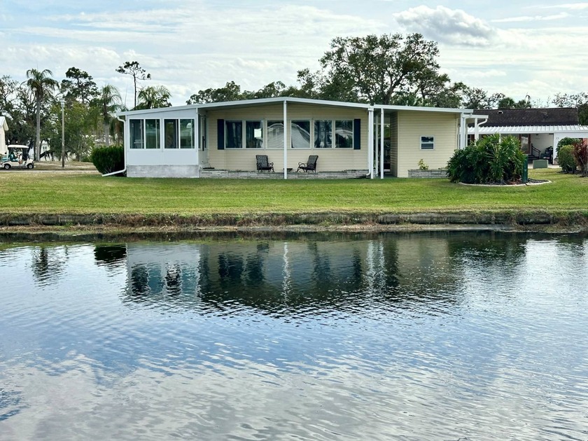 Discover resort-style living in this beautifully upgraded 2B/2B - Beach Home for sale in Nokomis, Florida on Beachhouse.com