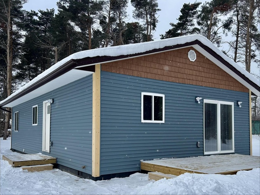 It's your chance to own a little piece of paradise with this - Beach Home for sale in Charlevoix, Michigan on Beachhouse.com