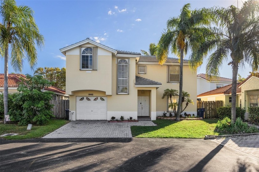 Enjoy serene lake views and radiant sunsets from this - Beach Home for sale in Cutler Bay, Florida on Beachhouse.com