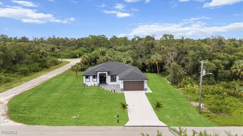 Welcome home to 654 Wentworth Dr, a beautifully crafted new - Beach Home for sale in Lehigh Acres, Florida on Beachhouse.com