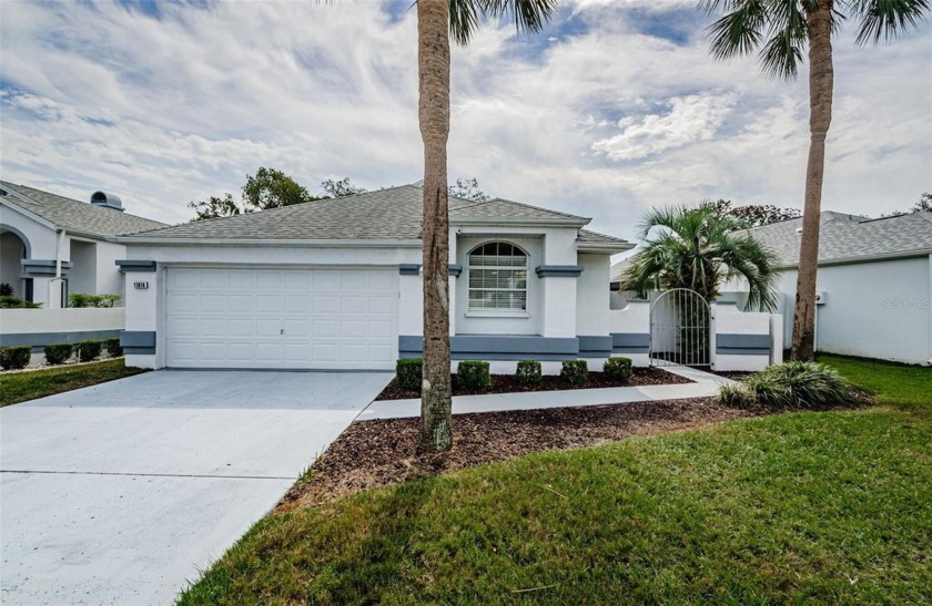 This classic Florida family home in beautiful Spring Hill is - Beach Home for sale in Spring Hill, Florida on Beachhouse.com