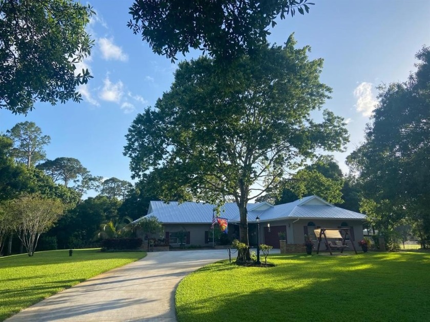 Welcome to your own little private paradise in this 3 bedroom, 2 - Beach Home for sale in Fort Pierce, Florida on Beachhouse.com
